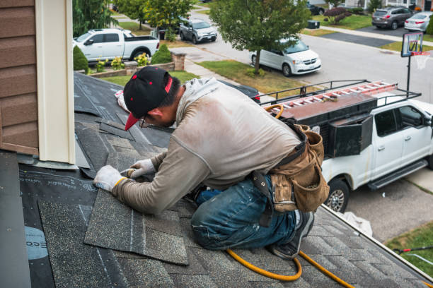 Professional Storm Damage Roof Repair technician working in New Hill, NC